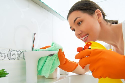 Local cleaners working in a Sutton flat with limited access