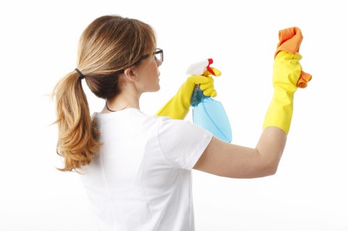 Safe kitchen cleaning setup with tools and protective measures