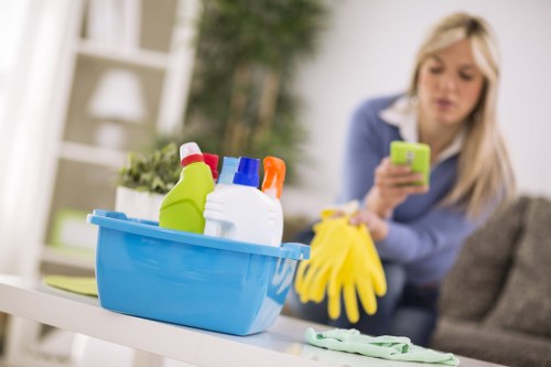 Professional carpet cleaner preparing equipment in Sutton